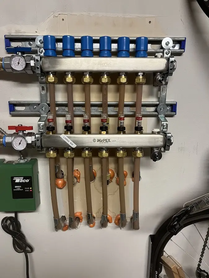 Plumber performing Gas Leak Detection at a residential property in Rittman